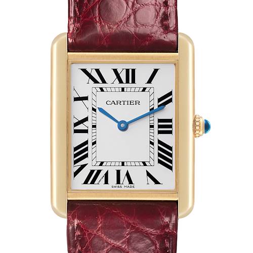 The Cartier Tank Solo W1018855 Men's Steel and Gold (two tone) Silver Dial W1018855 Men's Steel and Gold (two tone) Silver Dial watch is shown from a front angle, displaying its face, Roman numerals, blue hands, and red leather strap.
