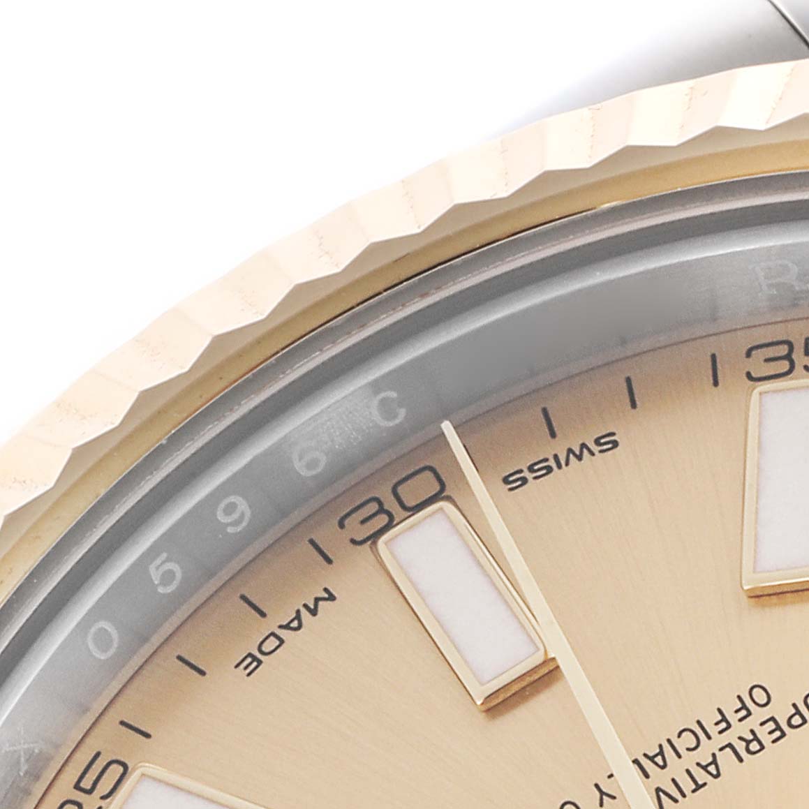 The image shows a close-up of the bezel and dial of the Rolex Datejust 41 116333 Men's Steel and Gold (two tone) Champagne Dial 116333 Men's Steel and Gold (two tone) Champagne Dial, highlighting the fluted bezel and indices.