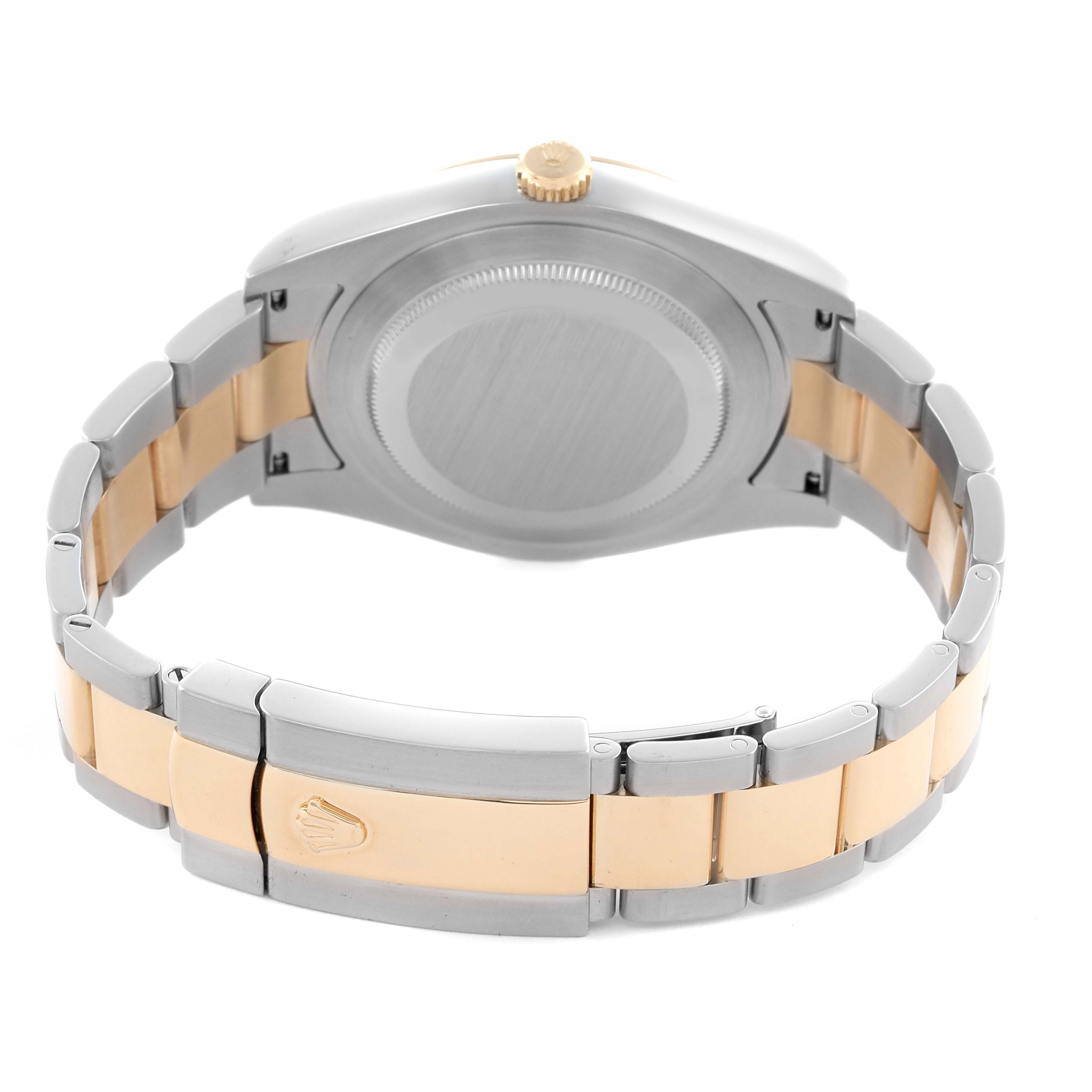 The Rolex Datejust 41 116333 Men's Steel and Gold (two tone) Champagne Dial 116333 Men's Steel and Gold (two tone) Champagne Dial is shown from the rear, highlighting the case back, bracelet, and clasp.