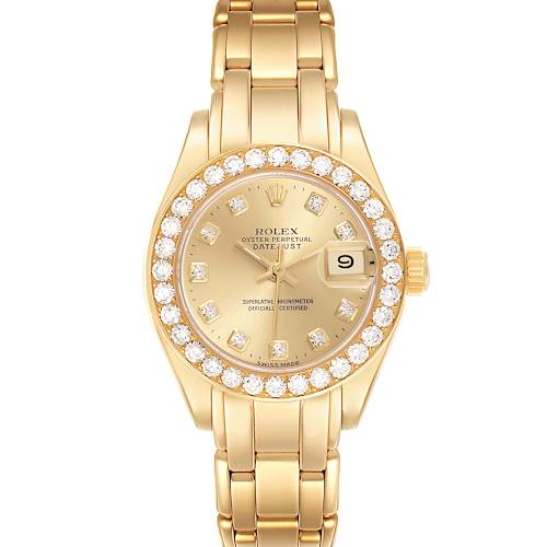 The Rolex Pearlmaster 69298 Women's Yellow Gold Champagne Dial 69298 Women's Yellow Gold Champagne Dial watch is shown from a top-down angle, displaying its diamond-studded bezel, dial, and bracelet.