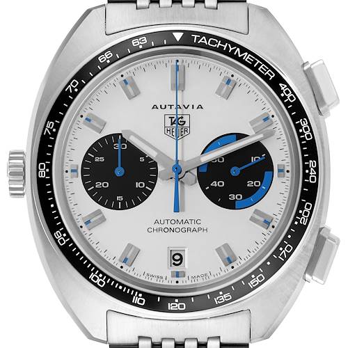 The image shows the front view of the Autavia model by Tag Heuer, displaying the watch face, bezel, and crown.