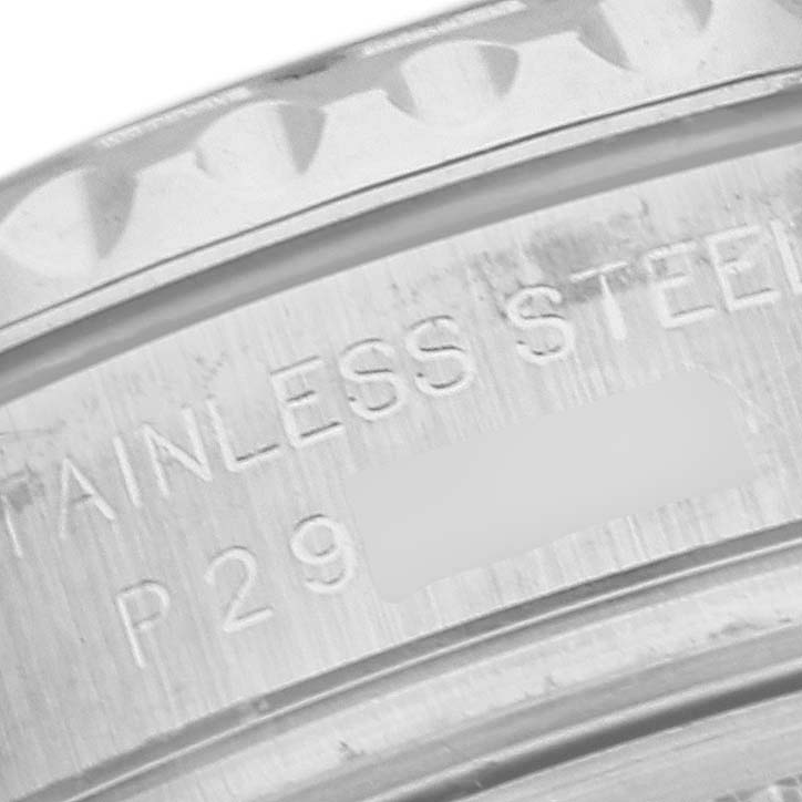 This image shows a close-up view of the side engraving on a Rolex Yacht-Master 169622 Women's Stainless Steel Silver Dial 169622 Women's Stainless Steel Silver Dial model, displaying the stainless steel text and partial serial number.