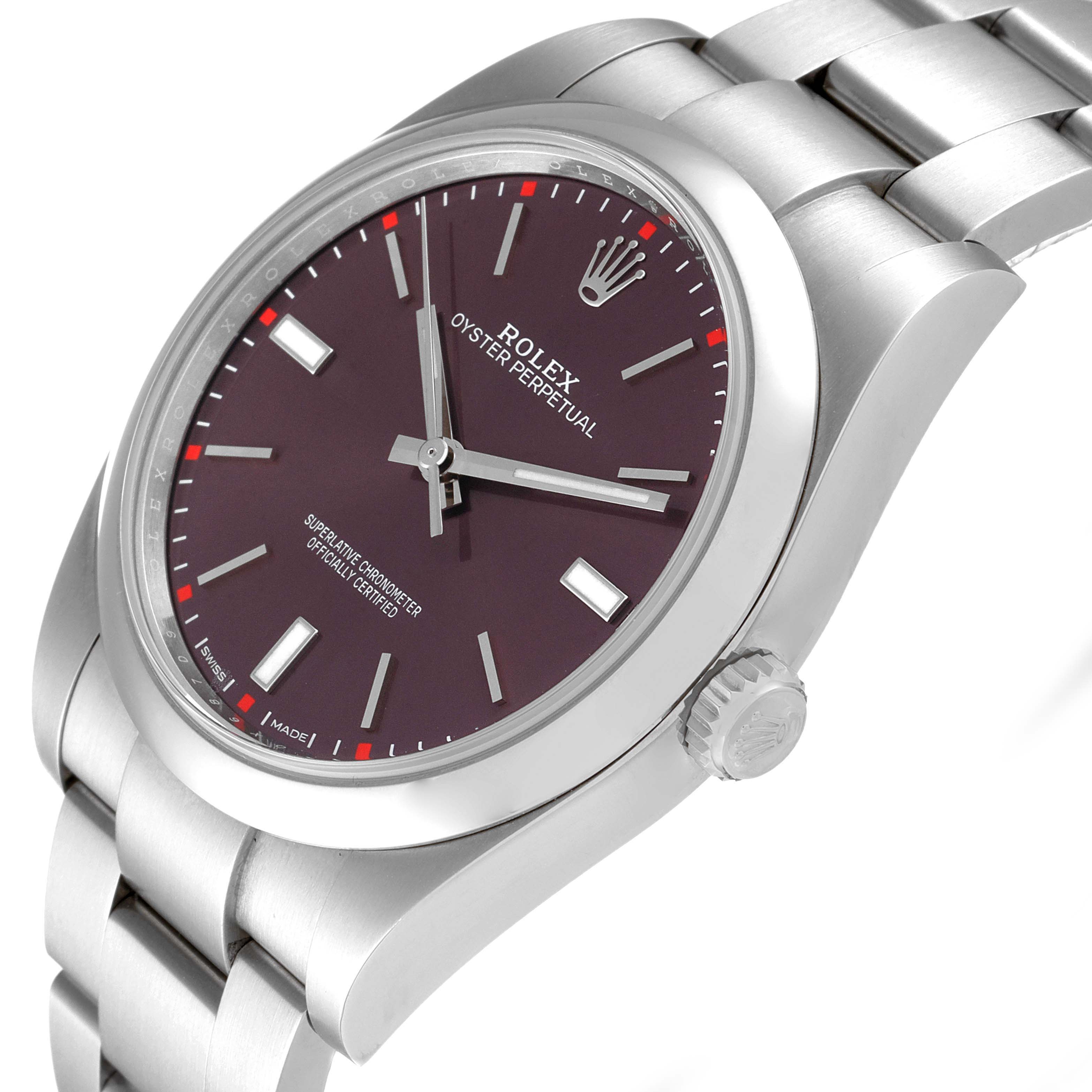 The image shows a Rolex Oyster Perpetual 114300 Men's Stainless Steel Burgundy Dial 114300 Men's Stainless Steel Burgundy Dial watch at an angled close-up, highlighting the dial, crown, and part of the bracelet.