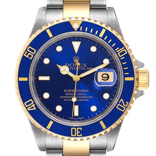 The image shows a front view of the Rolex Submariner 16613 Men's Steel and Gold (two tone) Blue Dial 16613 Men's Steel and Gold (two tone) Blue Dial watch, highlighting its blue dial, date display, and two-tone metal bracelet.