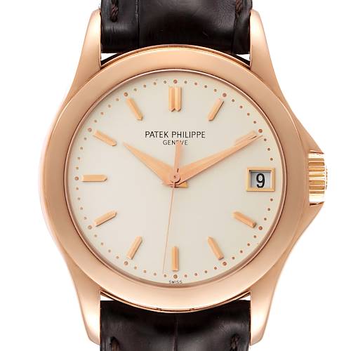The image shows a front view of a Patek Philippe Calatrava 5107R-001 Men's Rose Gold Silver Dial 5107R-001 Men's Rose Gold Silver Dial watch, highlighting its face, case, and partially its strap.