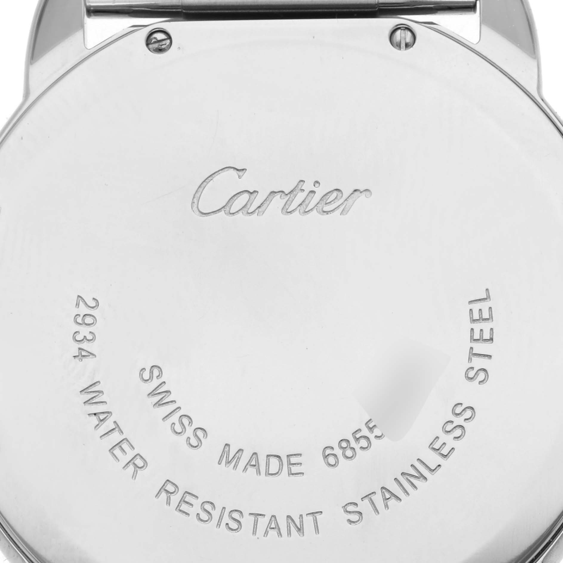 The image shows the back case of a Cartier Ronde W6701005 Men's Stainless Steel Silver Dial W6701005 Men's Stainless Steel Silver Dial watch, displaying engravings such as "Cartier" and other specifications.