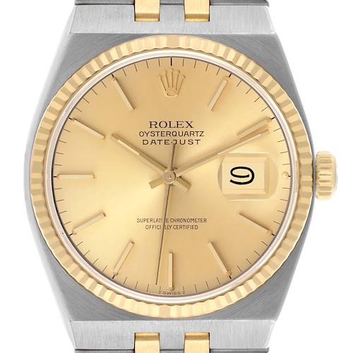 The Rolex Oysterquartz 17013 Men's Steel and Gold (two tone) Champagne Dial 17013 Men's Steel and Gold (two tone) Champagne Dial watch is shown from a straight-on angle, highlighting the dial, bezel, crown, and part of the bracelet.