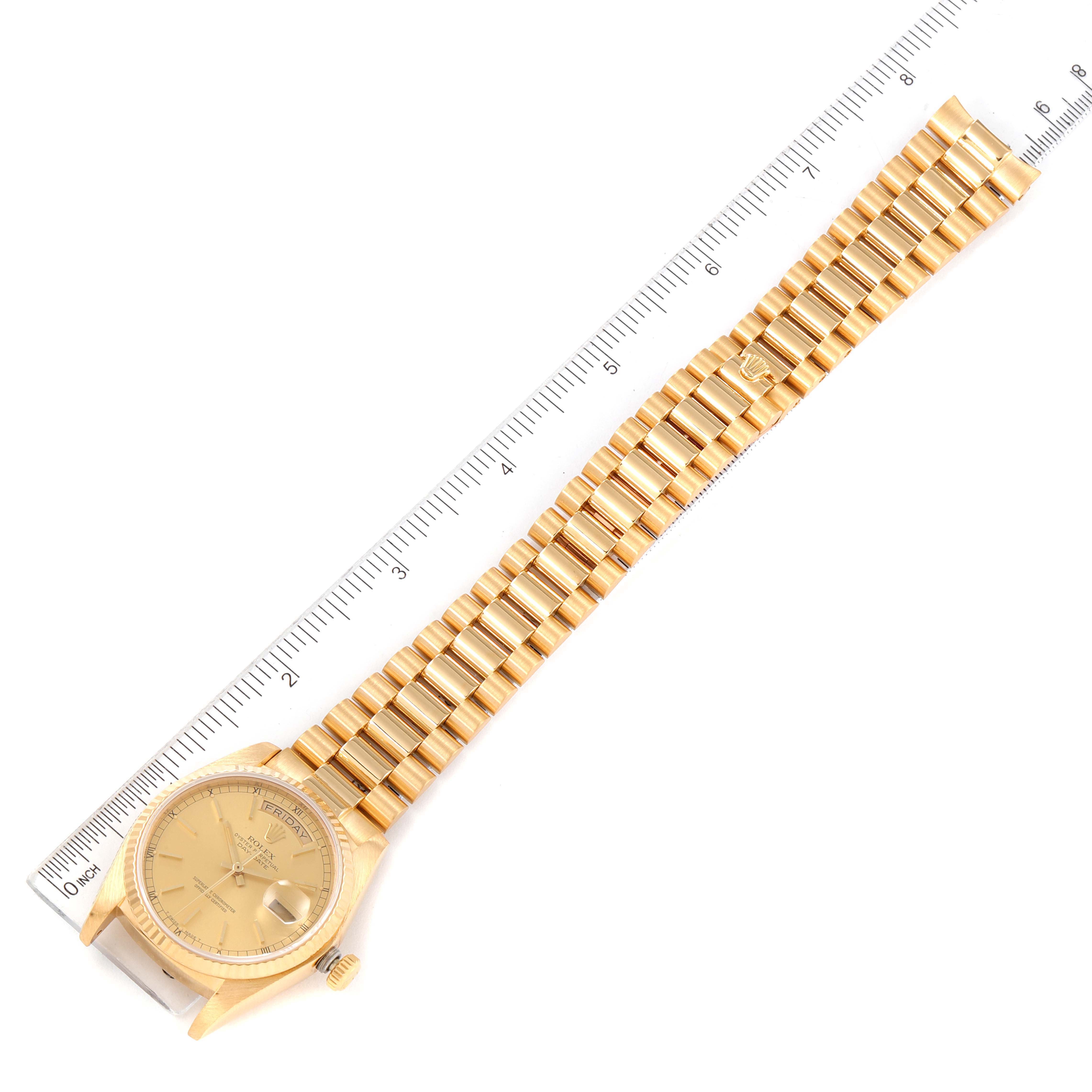 The image shows a Rolex President 18038 Men's Yellow Gold Champagne Dial 18038 Men's Yellow Gold Champagne Dial model watch laid flat with a ruler for scale.