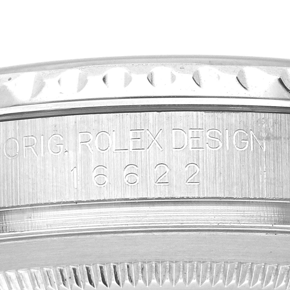 The image shows a close-up of the case side of a Rolex Yacht-Master 16622 Men's Stainless Steel Silver Dial 16622 Men's Stainless Steel Silver Dial, highlighting the engraved model number and design text.