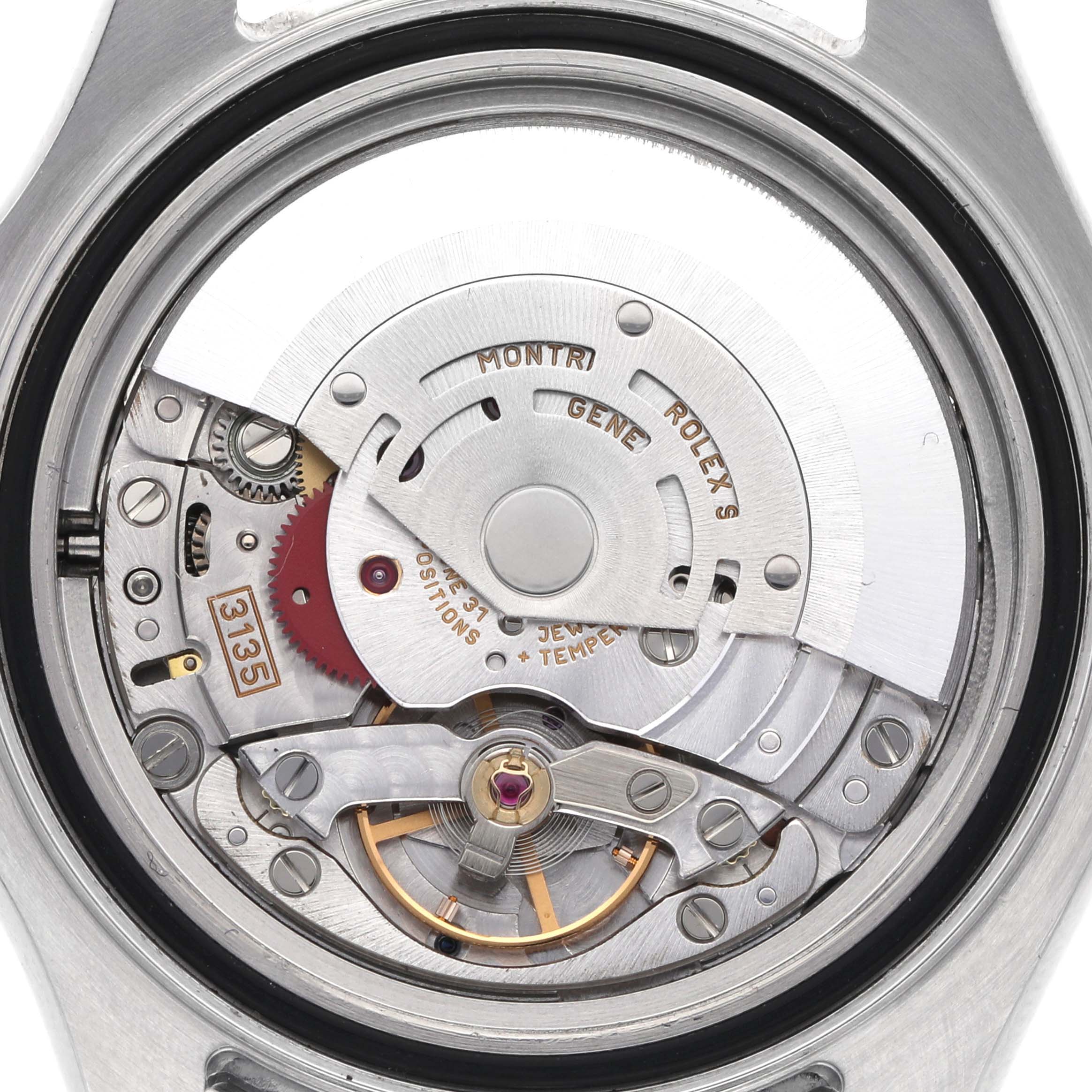 The image shows the movement of a Rolex Yacht-Master 16622 Men's Stainless Steel Silver Dial 16622 Men's Stainless Steel Silver Dial watch focused on the intricate internal mechanics.