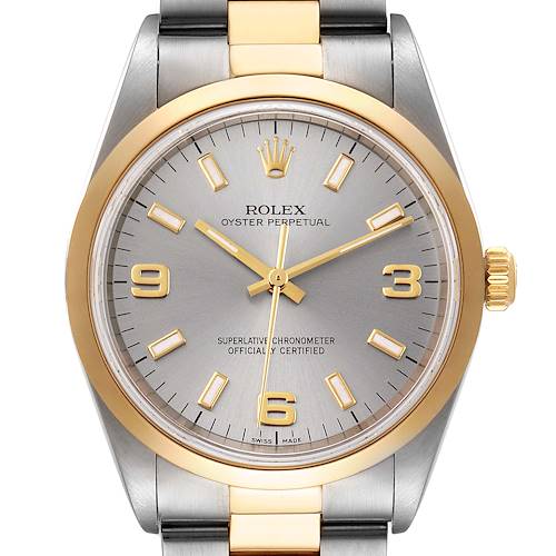The image shows a front view of a Rolex Oyster Perpetual 14203M Men's Steel and Gold (two tone) Grey Dial 14203M Men's Steel and Gold (two tone) Grey Dial watch, highlighting its dial, bezel, and bracelet.