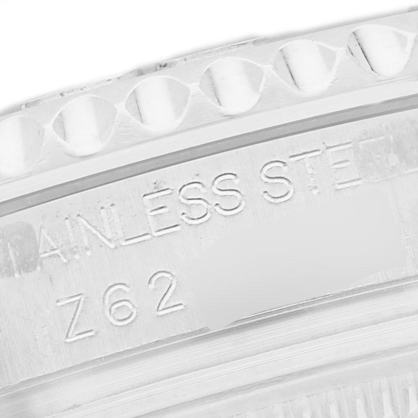 The image shows a close-up of the Rolex Yacht-Master 168622 Men's Stainless Steel Silver Dial 168622 Men's Stainless Steel Silver Dial’s bezel and engraved details like "STAINLESS STEEL".