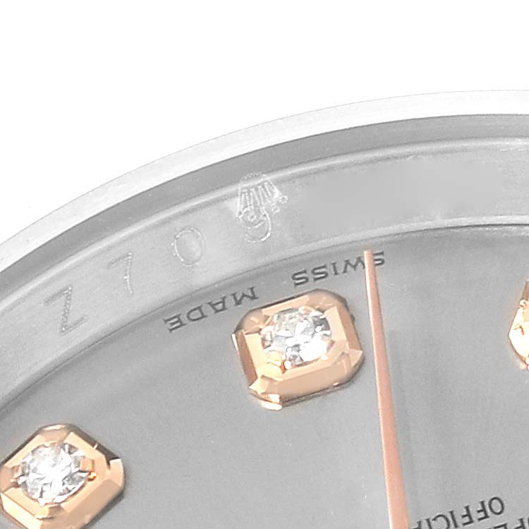 The image shows a close-up of the dial and diamond hour markers of a Rolex Datejust 116201 Men's Steel and Gold (two tone) Silver Dial 116201 Men's Steel and Gold (two tone) Silver Dial watch.