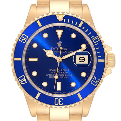 This is a front view of a Rolex Submariner 16618 Men's Yellow Gold Blue Dial 16618 Men's Yellow Gold Blue Dial watch showing its blue dial, bezel, date window, and bracelet.