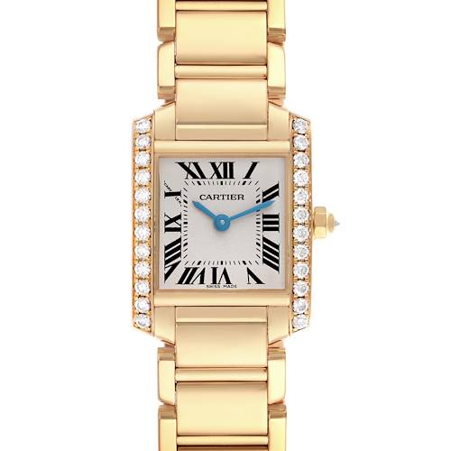 The Cartier Tank Française watch is shown from a top view, displaying its rectangular face, Roman numerals, bracelet, and diamond accents.