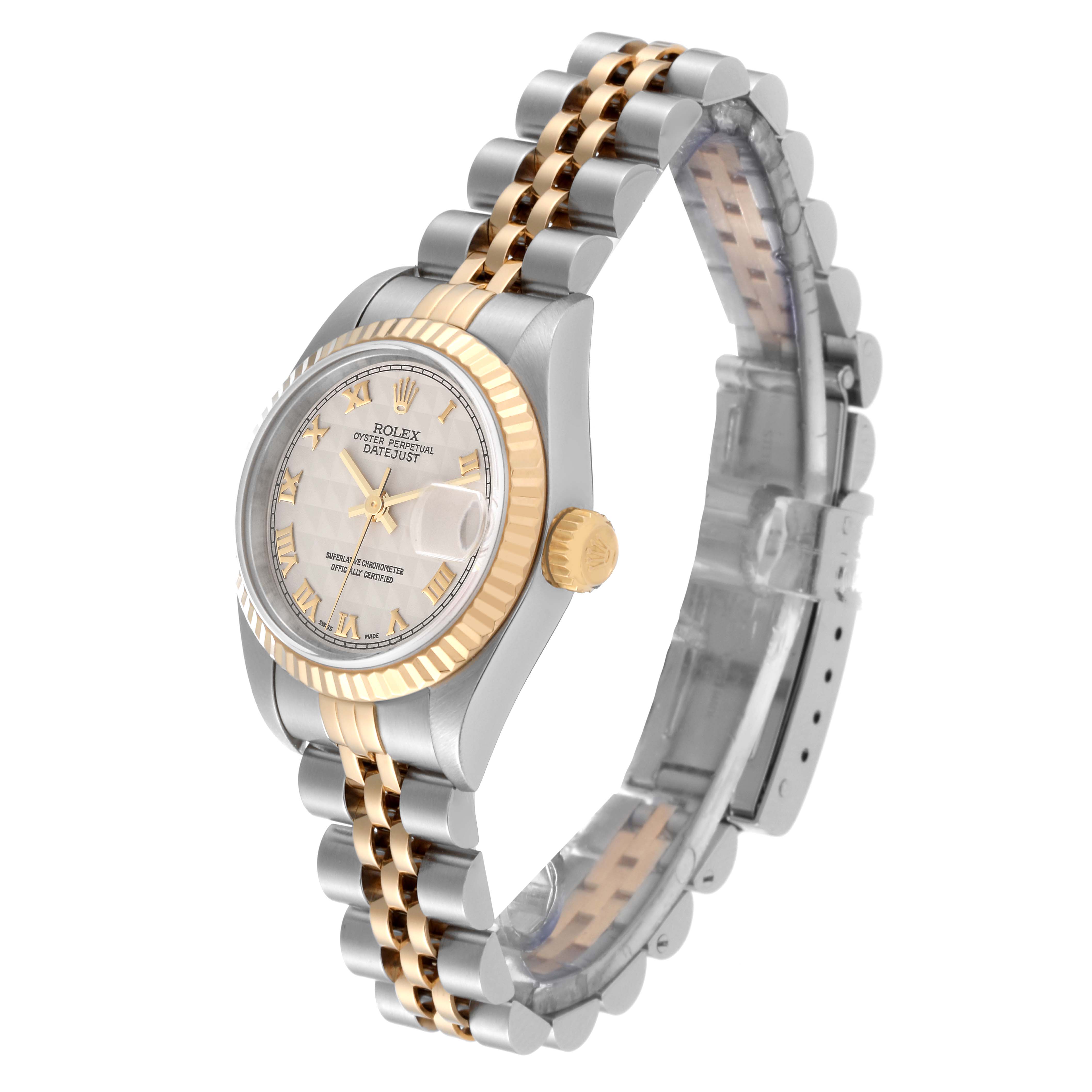 This image shows a side angle of the Rolex Datejust 79173 Women's Steel and Gold (two tone) Beige Dial 79173 Women's Steel and Gold (two tone) Beige Dial watch, highlighting its two-tone bracelet, crown, and fluted bezel.