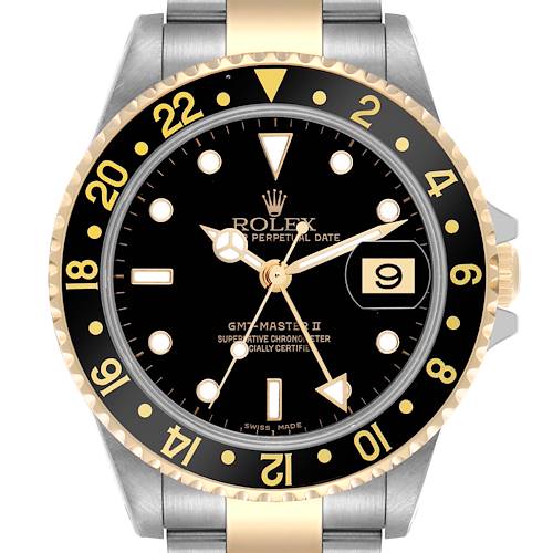 The Rolex GMT-Master 16713LN Men's Steel and Gold (two tone) Black Dial 16713LN Men's Steel and Gold (two tone) Black Dial watch is shown from a top-down angle, displaying the dial, bezel, hands, and date.