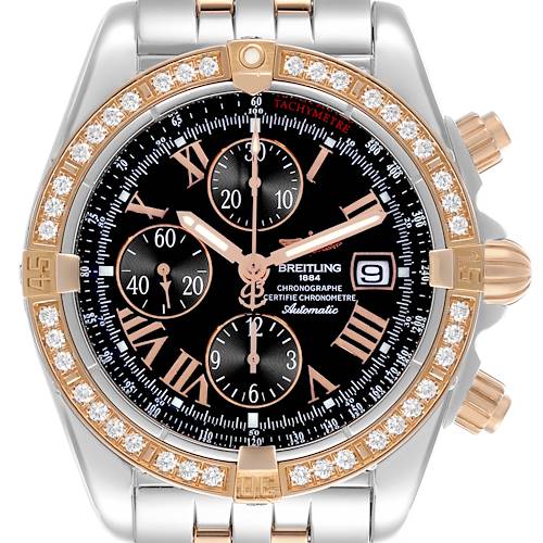 The Breitling Chronomat C1335653/B821 Men's Steel and Gold (two tone) Black Dial C1335653/B821 Men's Steel and Gold (two tone) Black Dial watch is shown from a top-down angle, highlighting its bezel, dial, and bracelet.
