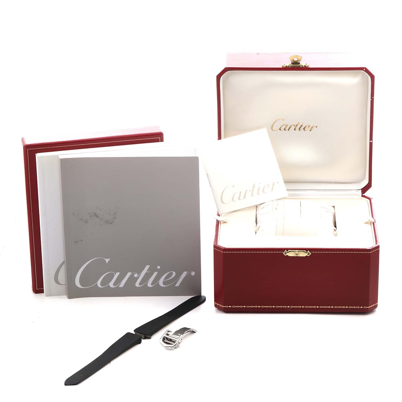 The image shows a Cartier Roadster W62016V3 Women's Stainless Steel Silver Dial W62016V3 Women's Stainless Steel Silver Dial watch with spare straps, a buckle, manuals, and its storage box, all displayed at an angle.