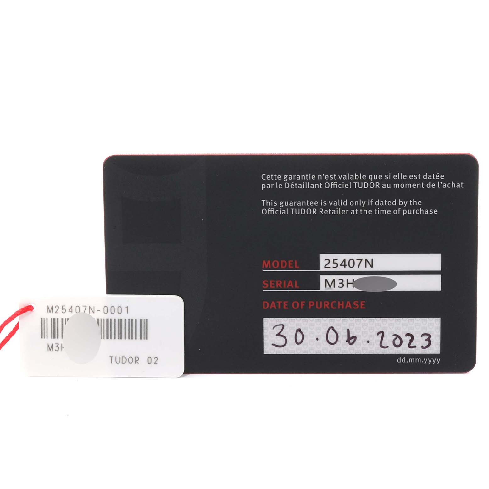 This image shows the guarantee card and tag for the Tudor Pelagos 25407N-0001 Men's Titanium Black Dial 25407N-0001 Men's Titanium Black Dial model 25407N, with purchase date 30.06.2023.