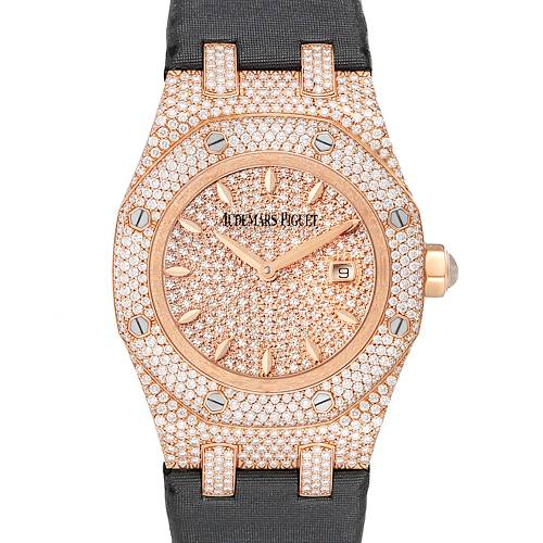 The Royal Oak model by Audemars Piguet is shown from the front, displaying its diamond-encrusted face, bezel, and case.