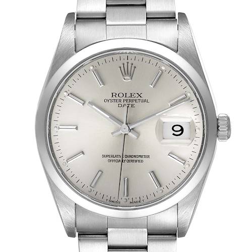 This image shows a Rolex Oyster Perpetual Date watch from a frontal angle, displaying the dial and bracelet.