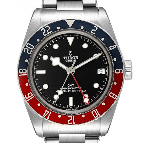 The image shows a front view of a Tudor Heritage Black Bay 79830RB Men's Stainless Steel Black Dial 79830RB Men's Stainless Steel Black Dial watch, featuring a black dial, red and blue bezel, and a stainless steel bracelet.