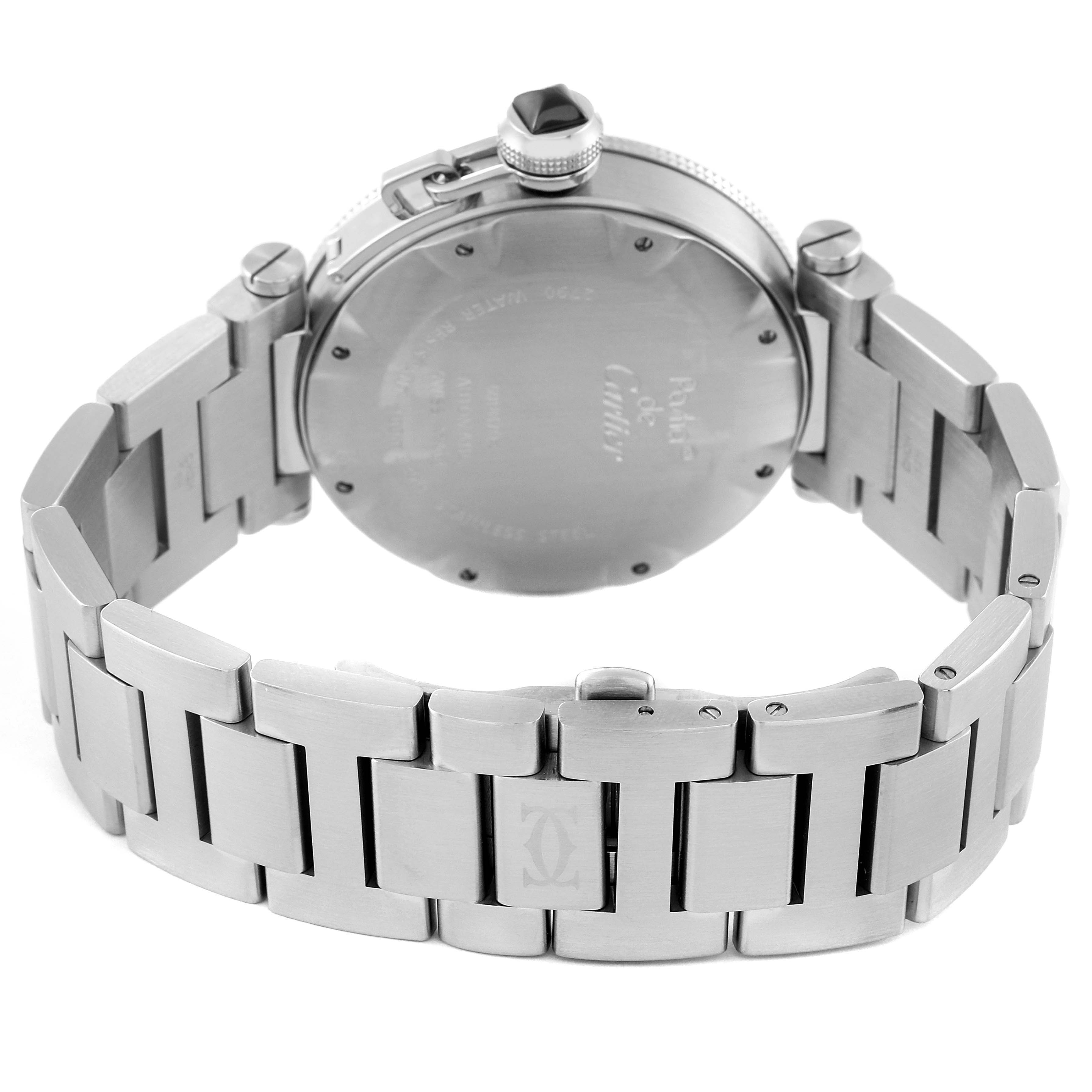 The image shows the back view of a Cartier Pasha W31077M7 Men's Stainless Steel Black Dial W31077M7 Men's Stainless Steel Black Dial watch, including the case back and stainless steel bracelet.