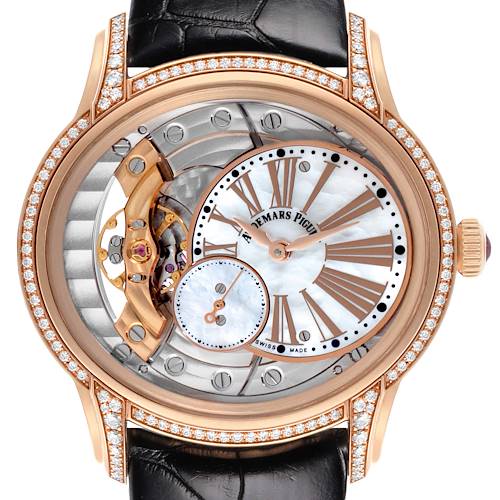 The Audemars Piguet Millenary 77247OR Women's Rose Gold Mother of Pearl Dial 77247OR Women's Rose Gold Mother of Pearl Dial watch is shown from a front angle, displaying its intricate dial and rose gold case with diamonds.
