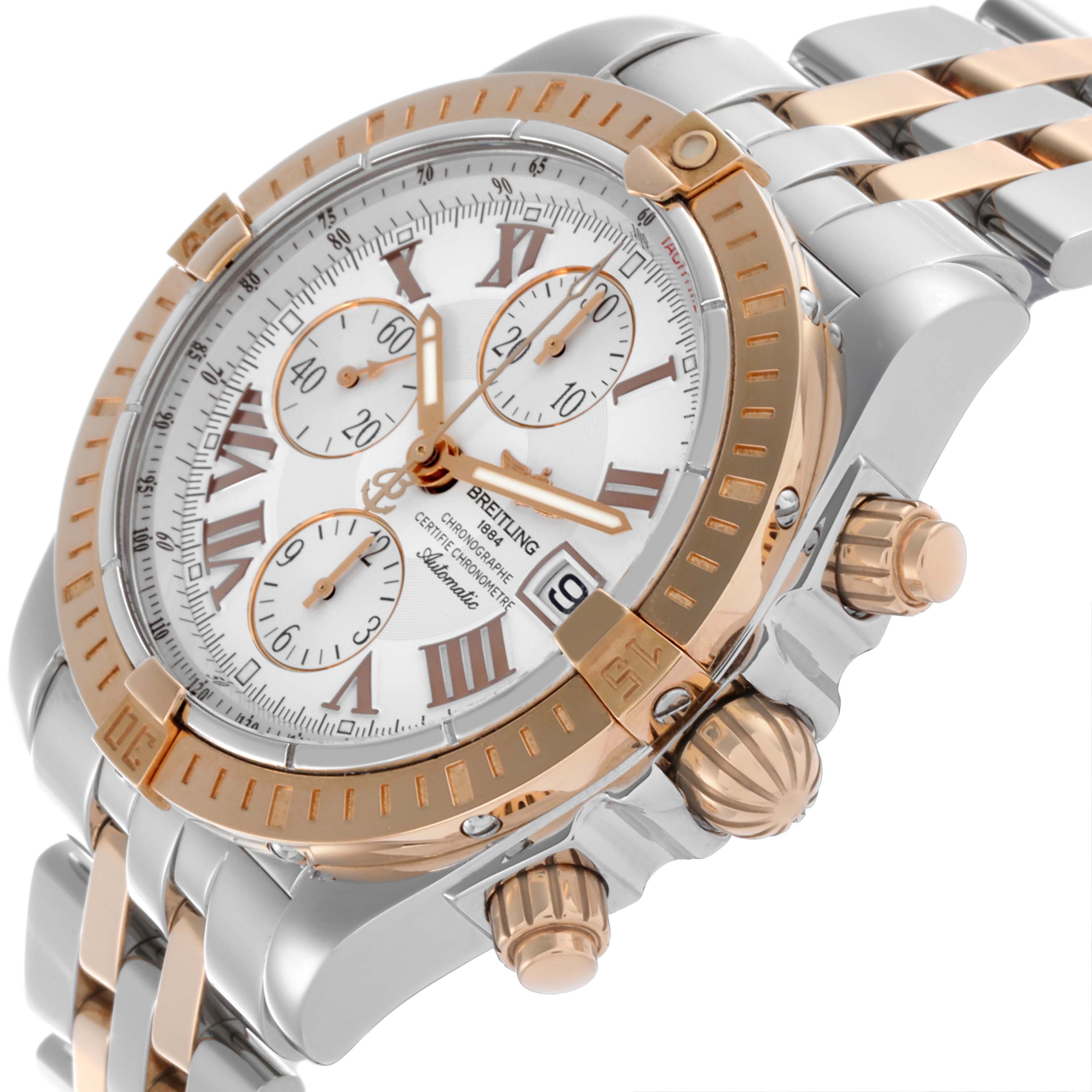 The Breitling Chronomat C156A19PAC Men's Steel and Gold (two tone) Silver Dial C156A19PAC Men's Steel and Gold (two tone) Silver Dial watch is shown at an angled close-up, highlighting the face, bezel, pushers, and part of the bracelet.