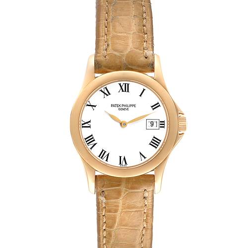 The image shows a front view of a Patek Philippe Calatrava 4906J-001 Women's Yellow Gold White Dial 4906J-001 Women's Yellow Gold White Dial watch with a brown leather strap and a white dial with Roman numerals.