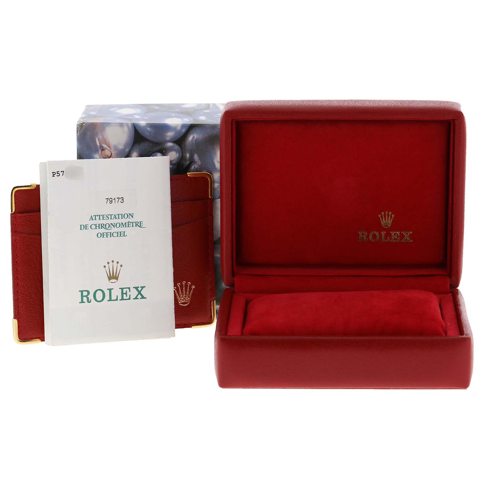 The image shows a red Rolex Datejust 79173 Women's Steel and Gold (two tone) White Dial 79173 Women's Steel and Gold (two tone) White Dial watch box, certificate, and booklets from a front angle.