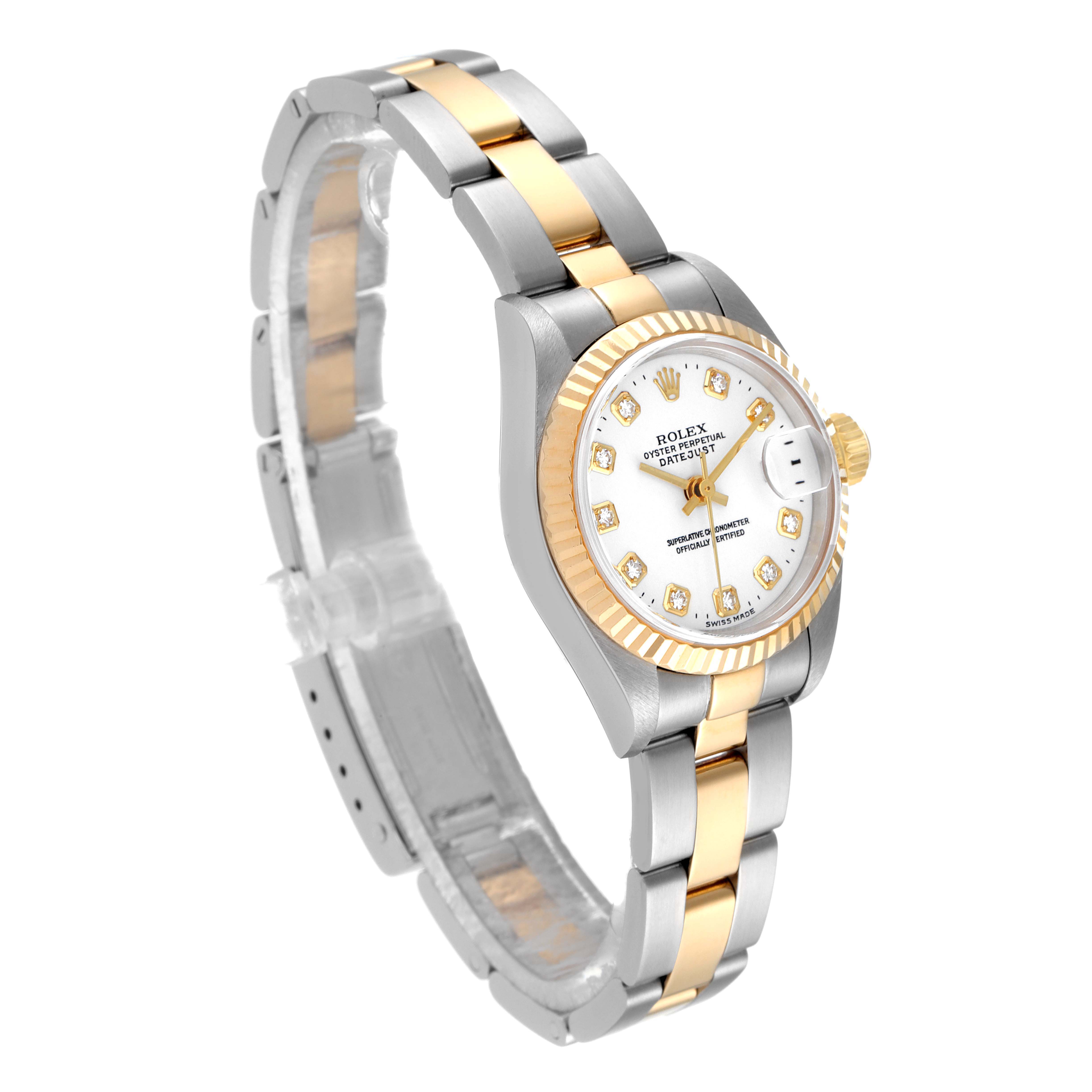 This Rolex Datejust 79173 Women's Steel and Gold (two tone) White Dial 79173 Women's Steel and Gold (two tone) White Dial watch is shown at a three-quarter angle, highlighting its two-tone bracelet, fluted bezel, and diamond hour markers.