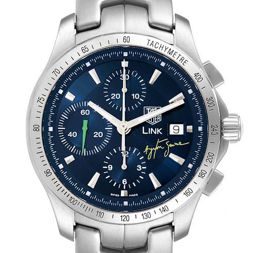 The Tag Heuer Link watch model is shown from a front angle, highlighting its blue dial, subdials, date window, and tachymeter bezel.