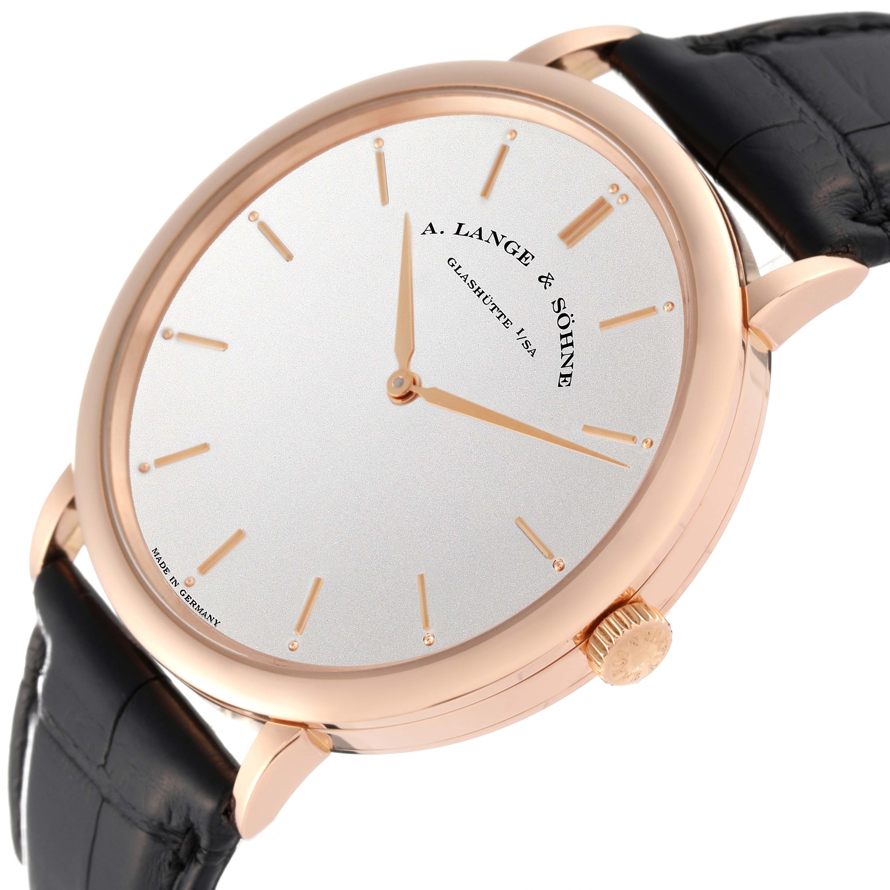 The A. Lange & Sohne Saxonia 211.032 Men's Rose Gold Silver Dial watch is shown at a slight side angle featuring its dial, case, crown, and leather strap.
