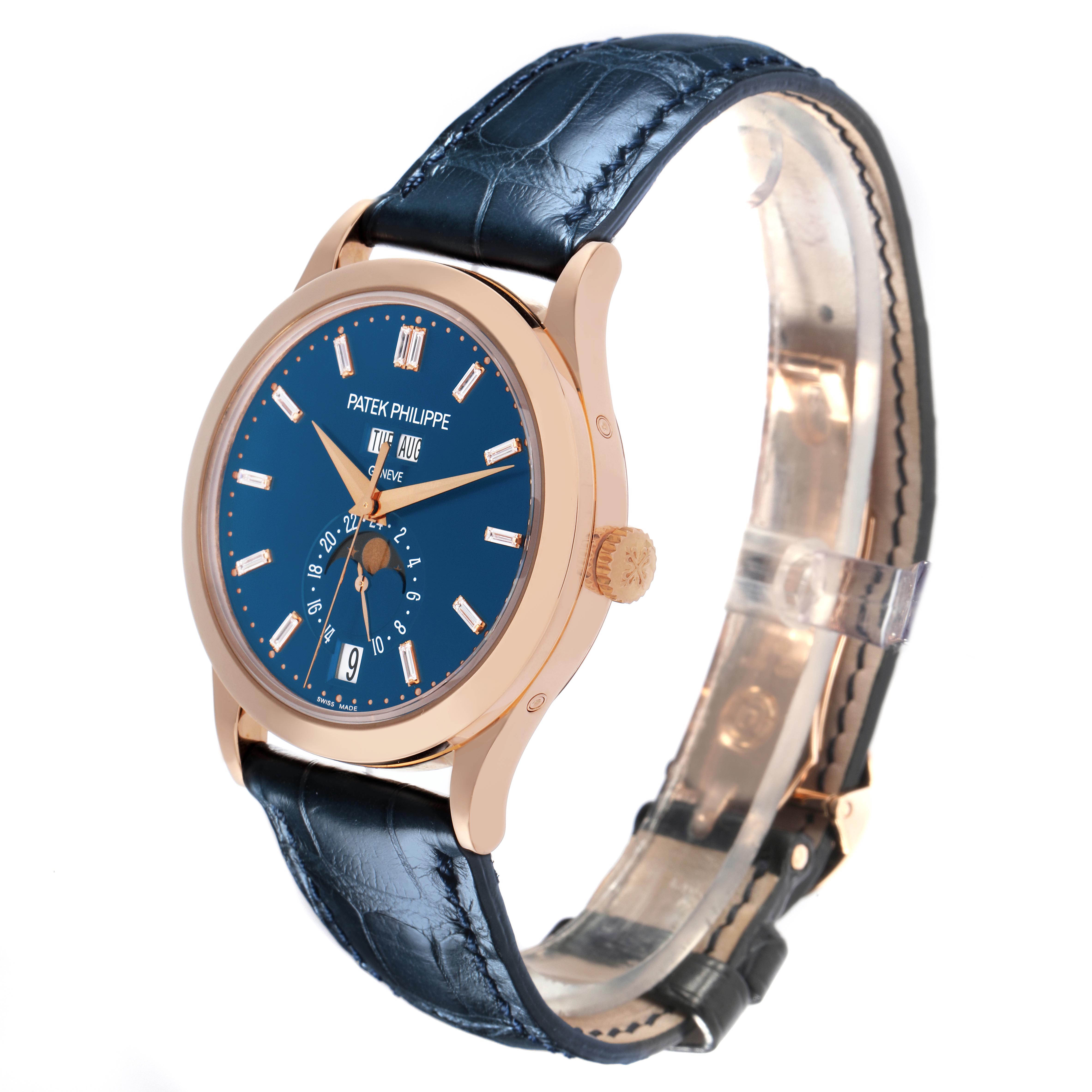 The Patek Philippe Complications 5396R-014 Men's Rose Gold Blue Dial 5396R-014 Men's Rose Gold Blue Dial watch is shown at a three-quarter angle, highlighting the blue dial, gold case, crown, and leather strap.