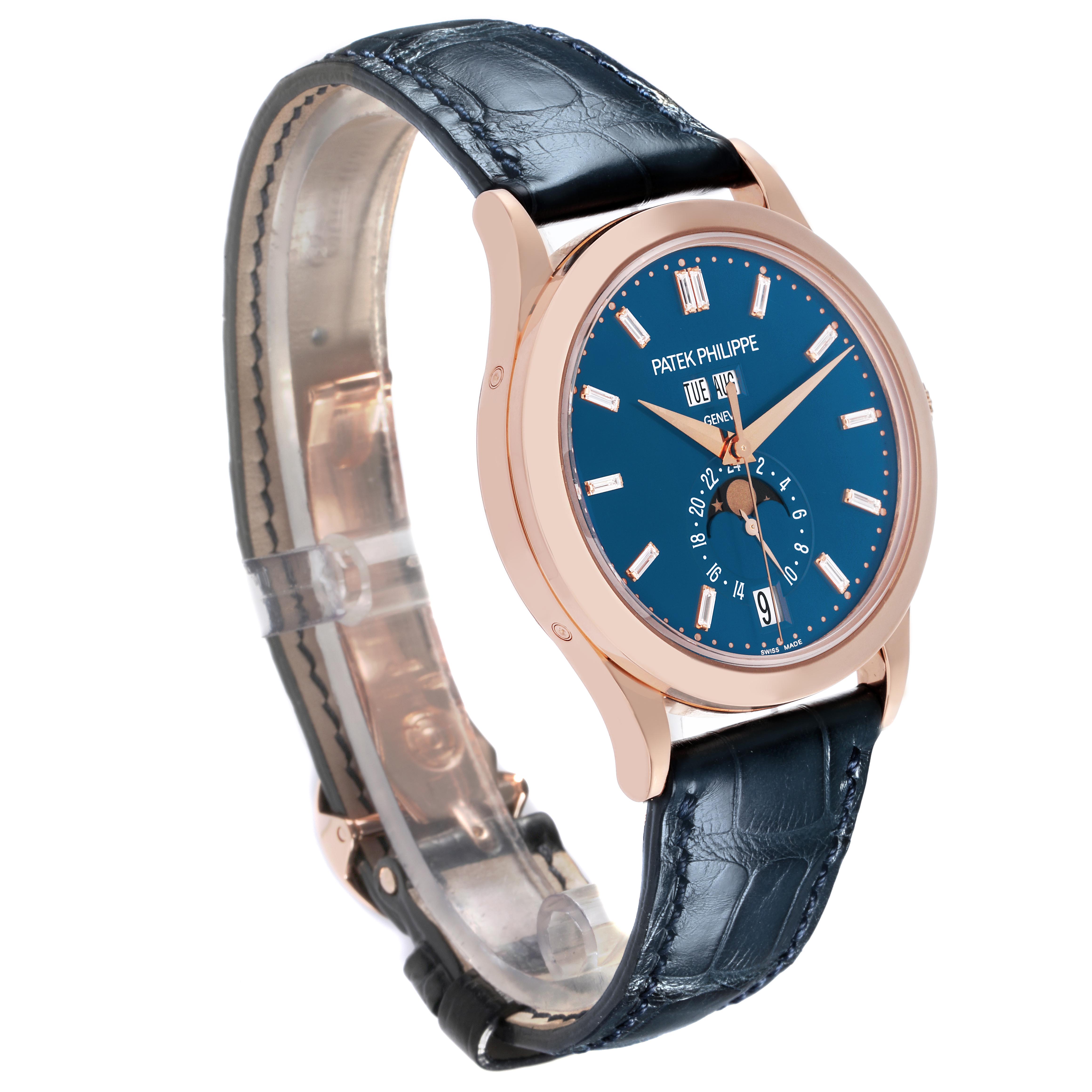 The Patek Philippe Complications 5396R-014 Men's Rose Gold Blue Dial 5396R-014 Men's Rose Gold Blue Dial is shown at a slight side angle, displaying its blue dial, rose gold case, and leather strap.