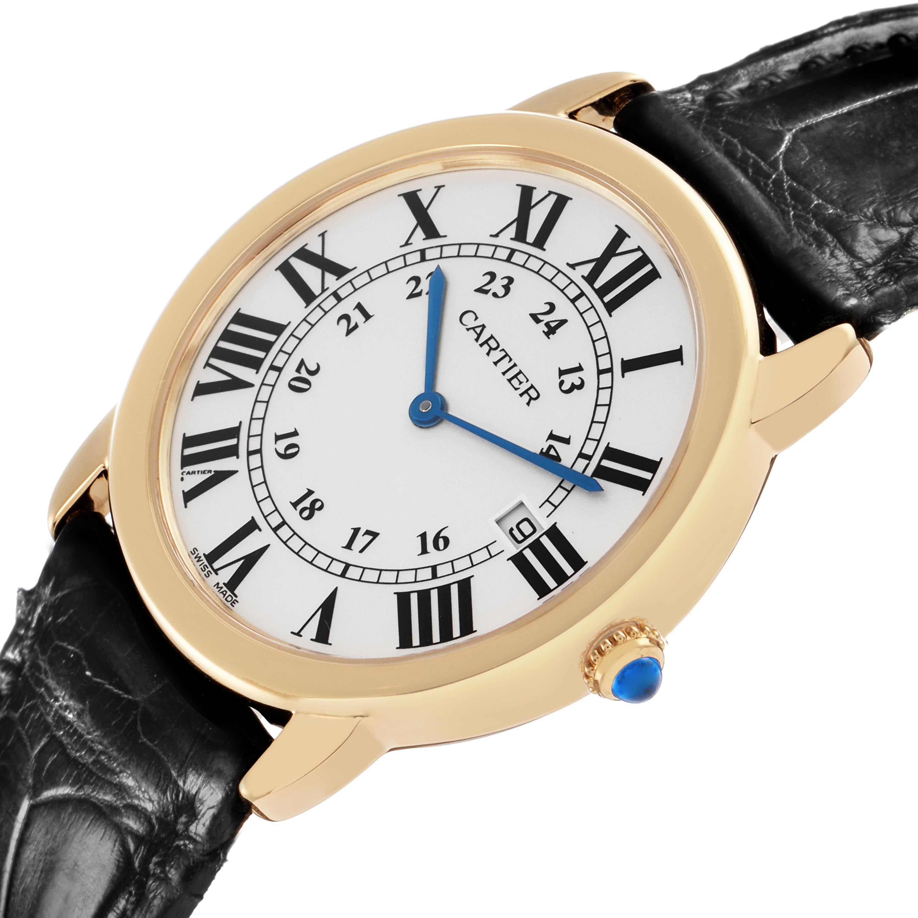 The Cartier Ronde W6700455 Men's Yellow Gold Silver Dial W6700455 Men's Yellow Gold Silver Dial watch is shown at a slight angle, highlighting the face, Roman numerals, gold bezel, and black leather strap.