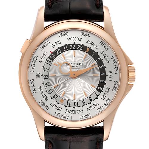 This image shows a Patek Philippe Complications 5130R-001 Men's Rose Gold Silver Dial 5130R-001 Men's Rose Gold Silver Dial model watch front-on, displaying its world time dial and brown leather strap.