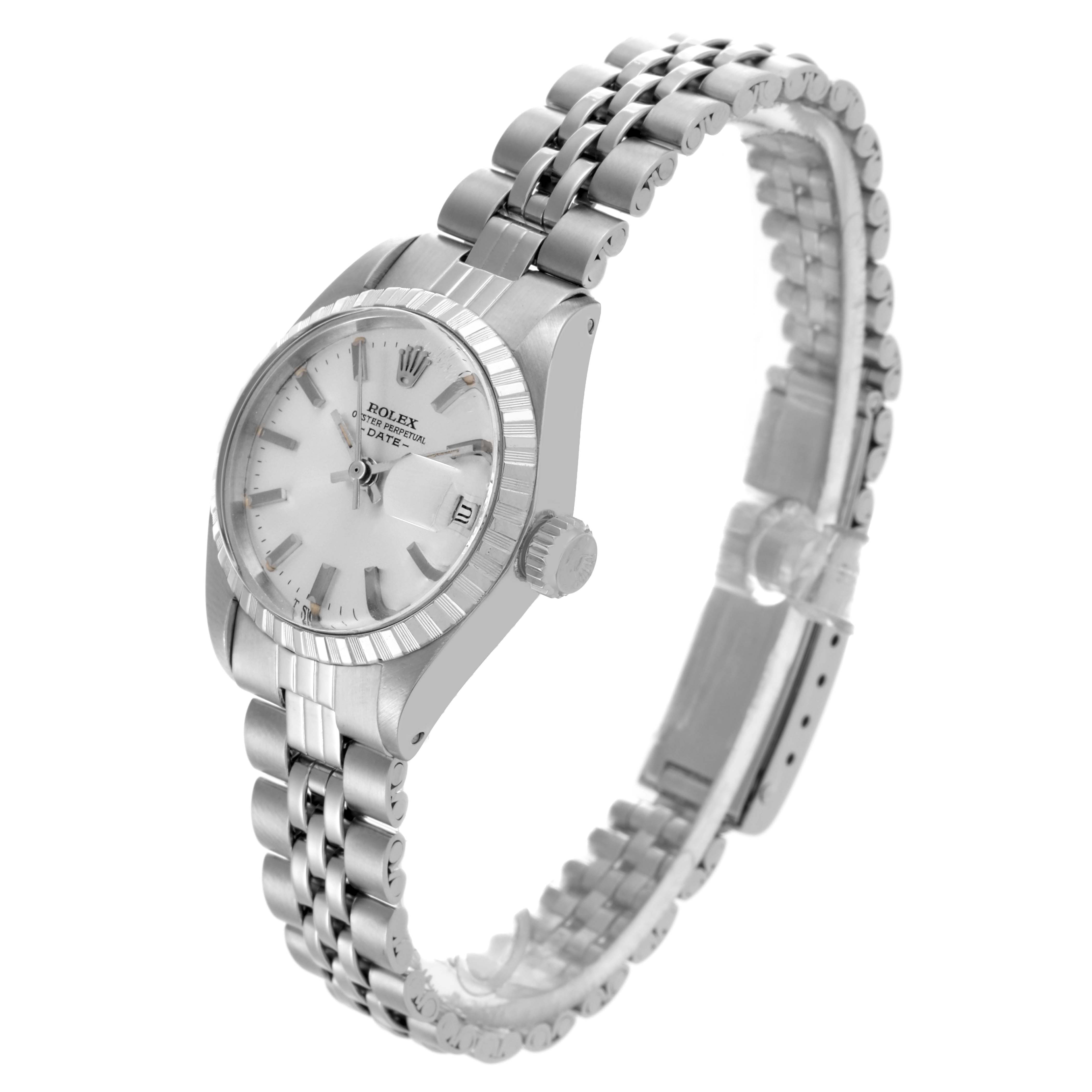 The Rolex Date 6924 Women's Stainless Steel Silver Dial 6924 Women's Stainless Steel Silver Dial watch is shown at a side angle, highlighting the case, bracelet, and crown.