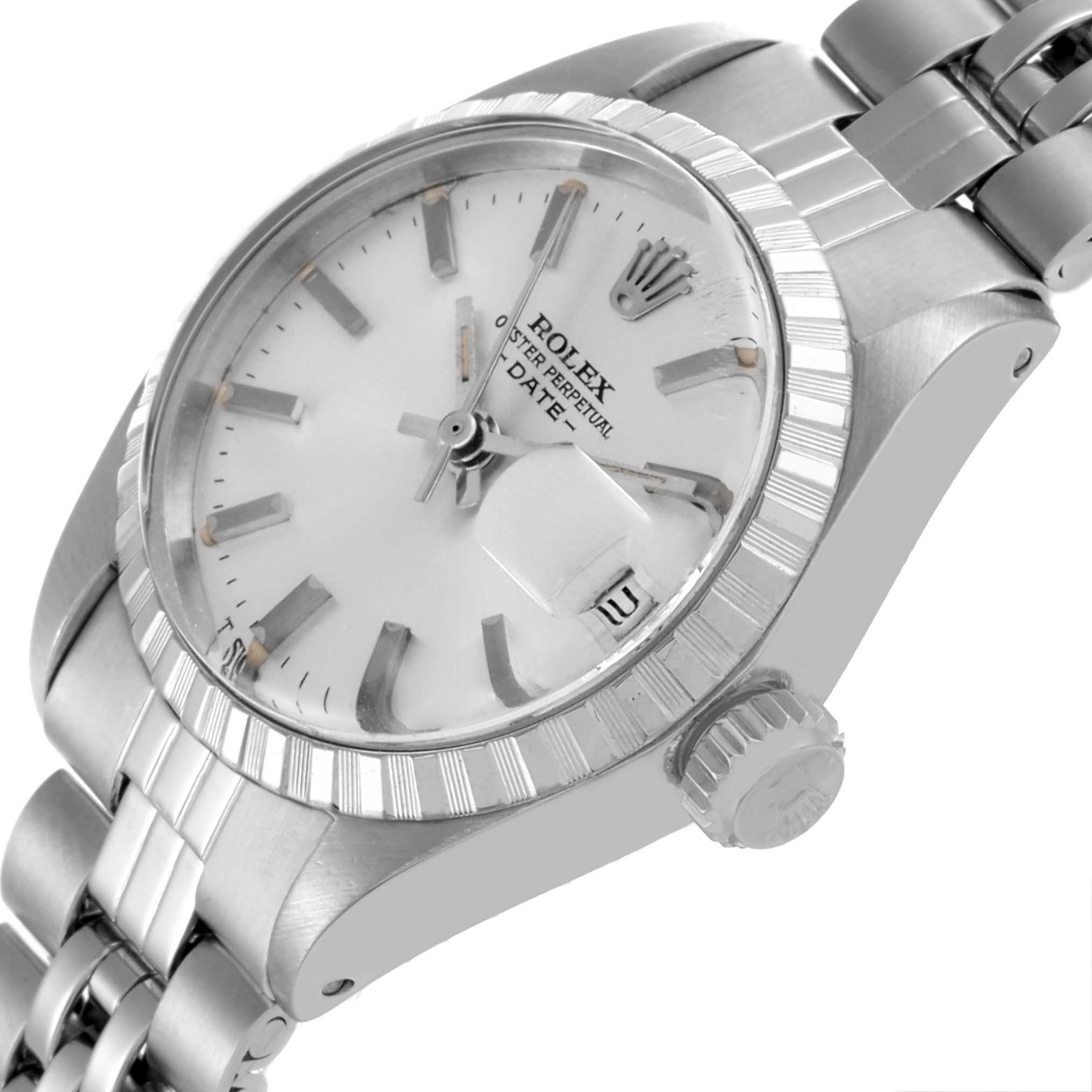 The Rolex Date 6924 Women's Stainless Steel Silver Dial 6924 Women's Stainless Steel Silver Dial model is shown at a three-quarter angle, displaying the face, bezel, crown, and part of the bracelet.