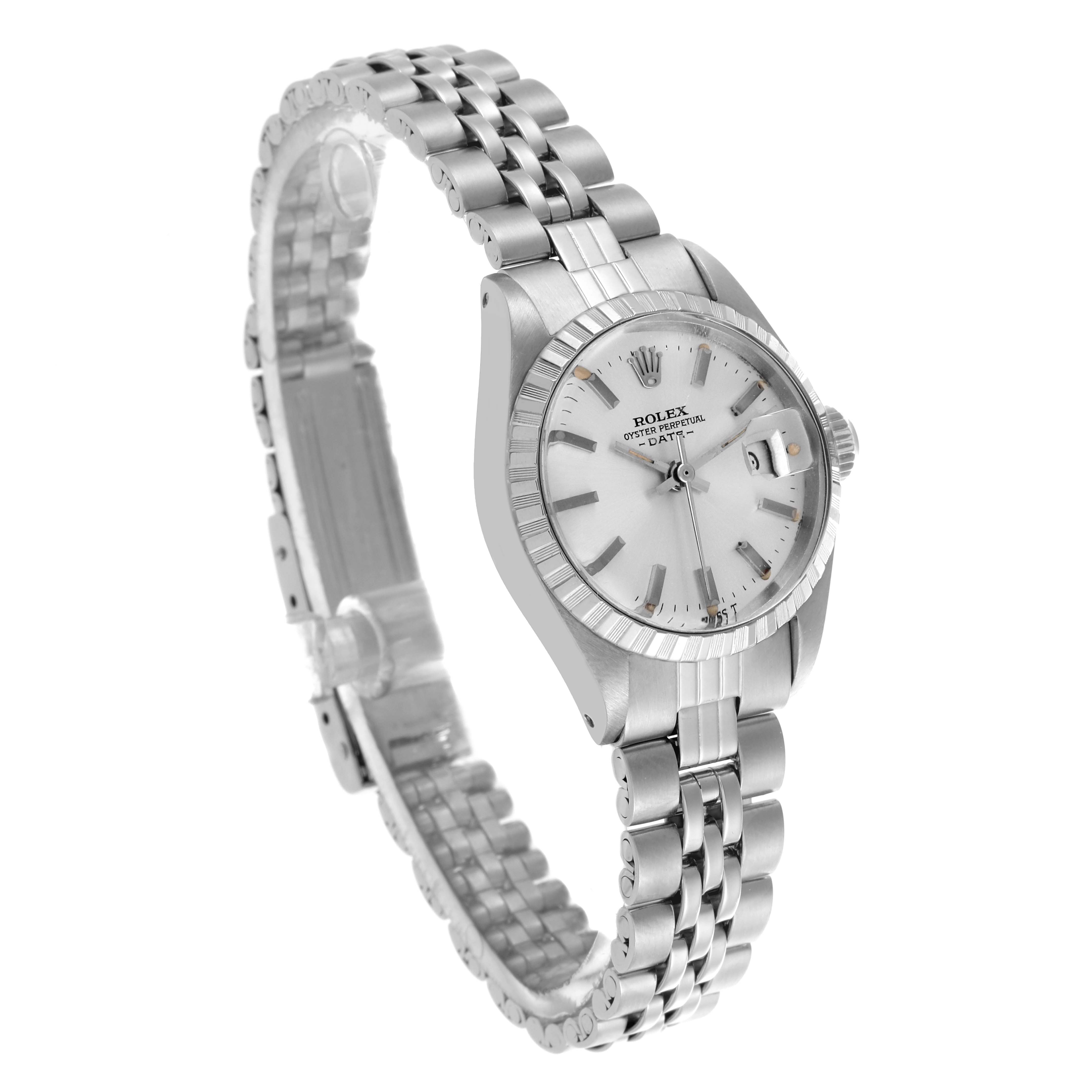 This Rolex Date 6924 Women's Stainless Steel Silver Dial 6924 Women's Stainless Steel Silver Dial model watch is shown at a three-quarter angle, highlighting the face, bezel, and bracelet.