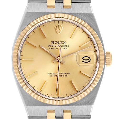 The Rolex Oysterquartz 17013 Men's Steel and Gold (two tone) Champagne Dial 17013 Men's Steel and Gold (two tone) Champagne Dial is shown from the front, displaying the dial, case, bezel, crown, and part of the bracelet.