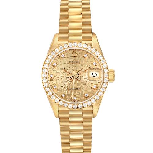 The Rolex President 69138 Women's Yellow Gold Champagne Dial 69138 Women's Yellow Gold Champagne Dial model watch is shown from a top-down angle, displaying its gold bracelet, diamond bezel, and date window.