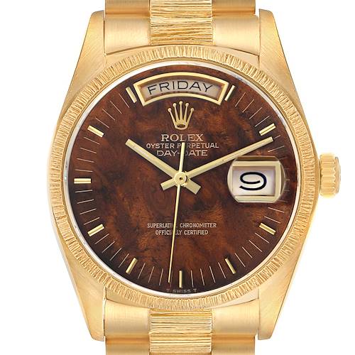 The Rolex President 18078 Men's Yellow Gold Brown Dial 18078 Men's Yellow Gold Brown Dial watch is shown from a front angle, highlighting its face, day and date windows, and part of the bracelet.