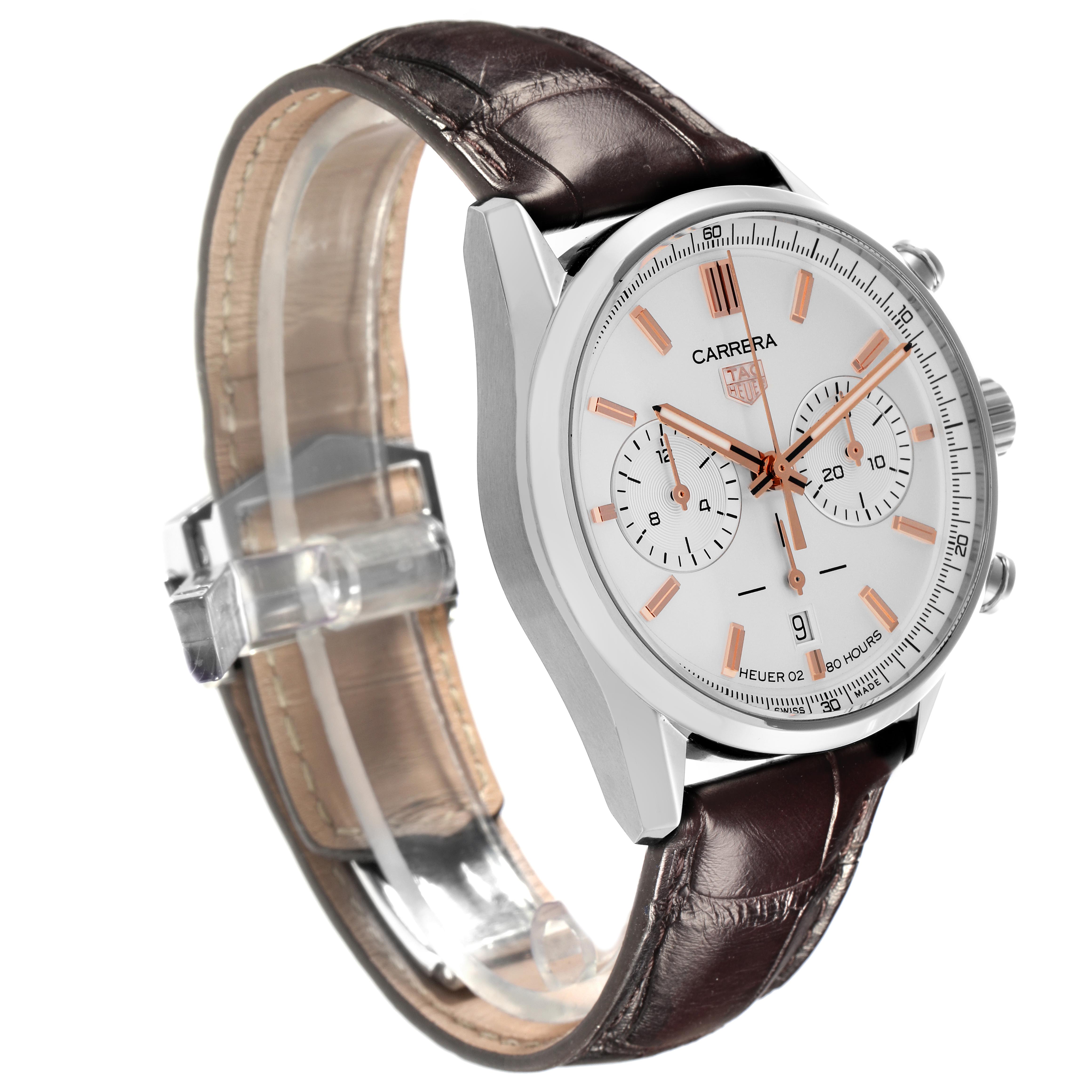 The Tag Heuer Carrera CBN2013-0 Men's Stainless Steel Silver Dial CBN2013-0 Men's Stainless Steel Silver Dial watch is shown at a three-quarter angle, displaying its leather strap and round dial with subdials.