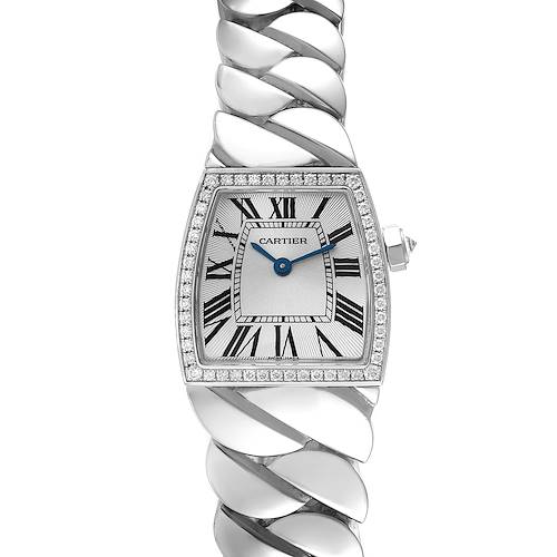 This image shows a top view of the Cartier La Dona WE601005 Women's White Gold Silver Dial WE601005 Women's White Gold Silver Dial watch, focusing on its face, bracelet, and crown.