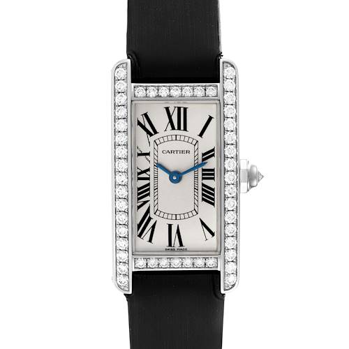 The image shows a frontal view of a Cartier Tank Americaine WB707331 Women's White Gold Silver Dial WB707331 Women's White Gold Silver Dial watch with a black strap and gem-set bezel.