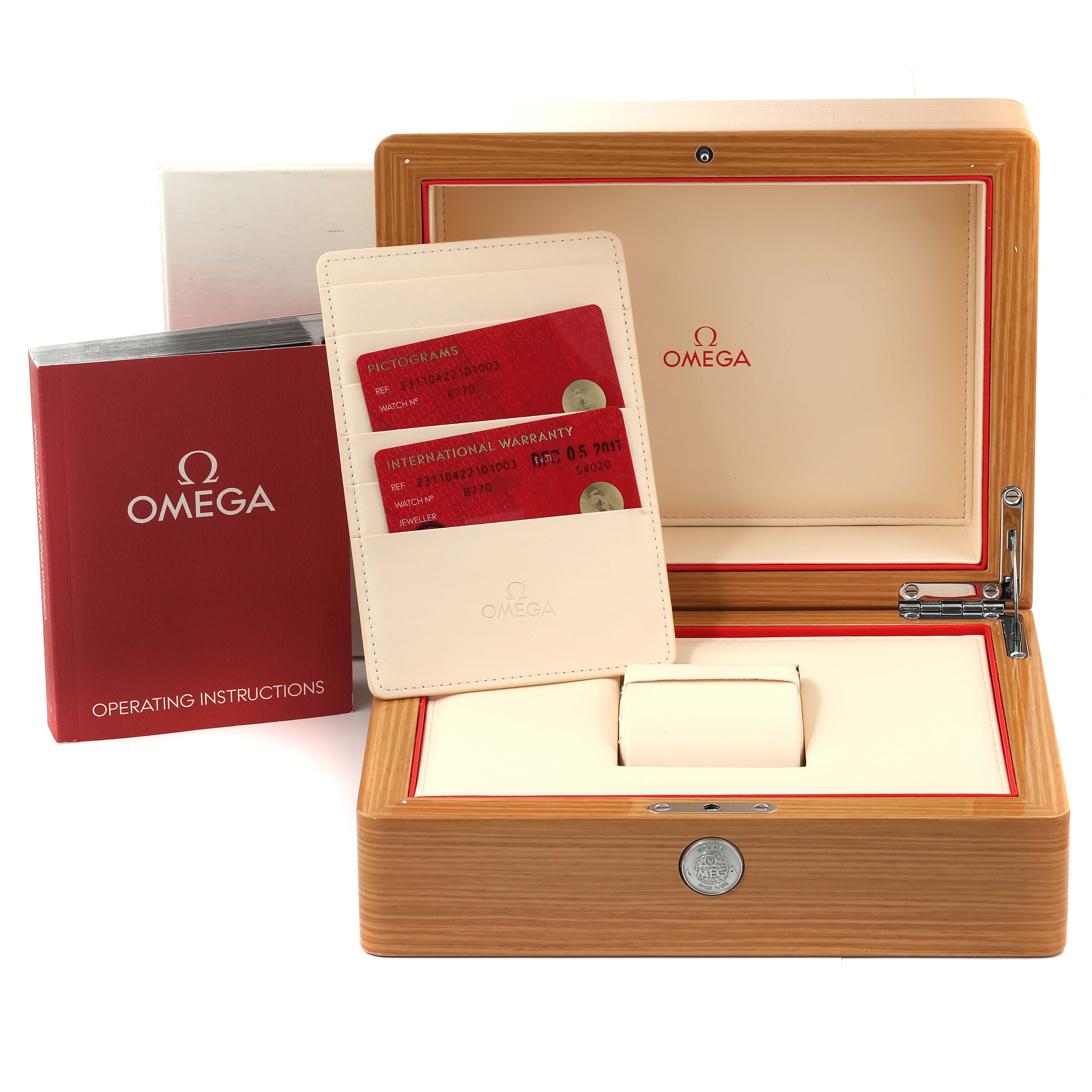 The image shows the packaging and accessories for the Omega Aqua Terra 231.10.42.21.01.003 Men's Stainless Steel Black Dial 231.10.42.21.01.003 Men's Stainless Steel Black Dial, including the box, operating instructions, and warranty cards.