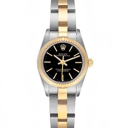 The Rolex Oyster Perpetual 76243 Women's Steel and Gold (two tone) Black Dial 76243 Women's Steel and Gold (two tone) Black Dial watch is shown from a top-down angle, highlighting its dual-tone bracelet and black dial.